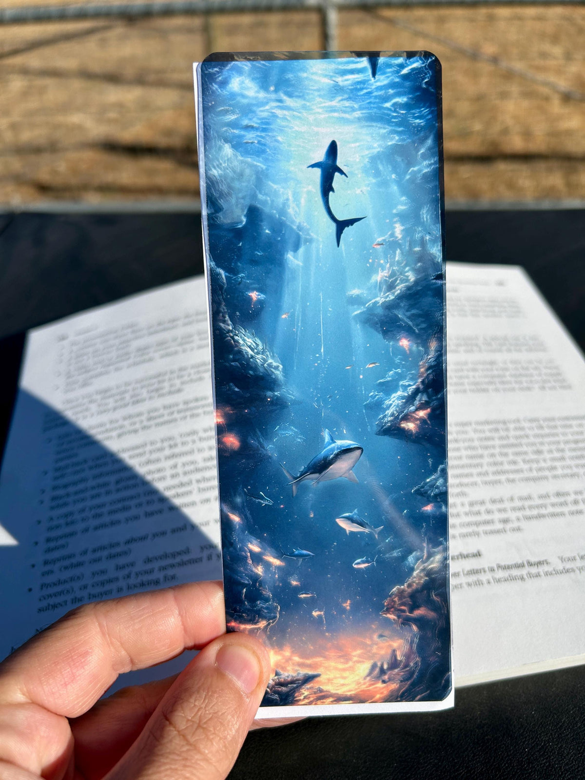 Bioluminescent ocean bookmark with glowing sea creatures | deep underwater fantasy with whales and lava reef